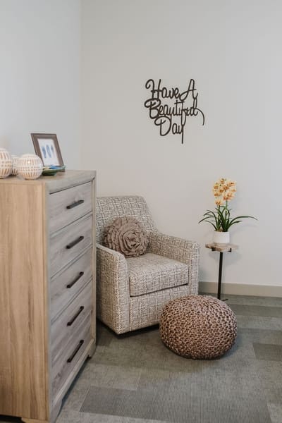 Cozy interior with a decorative chair and wall art