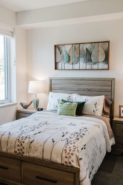 Cozy private resident room with floral bedding