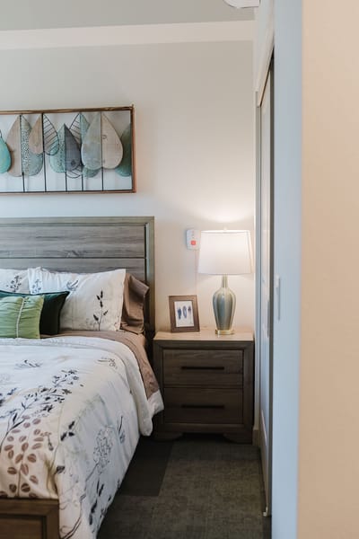 Cozy resident room with bed and decor