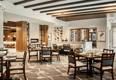 Elegant dining room setup with tables and chairs