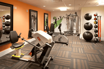 Interior view of a fitness area with exercise equipment