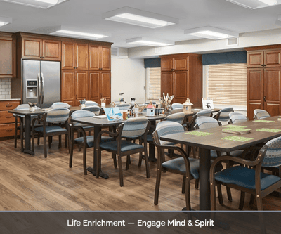 Interior view of an activity room with tables and chairs