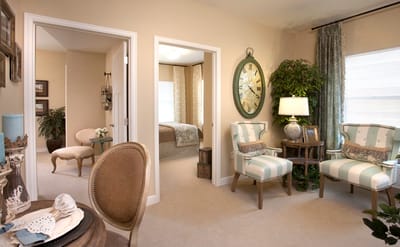 A cozy internal room with chairs and decor