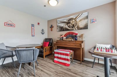 Cozy common area with patriotic decor and seating