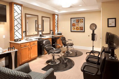 Interior view of a salon area with styling chairs