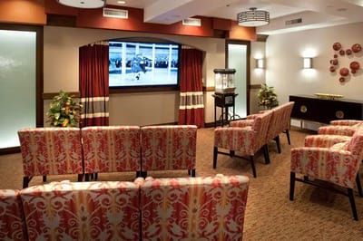 Interior common area with seating and a television