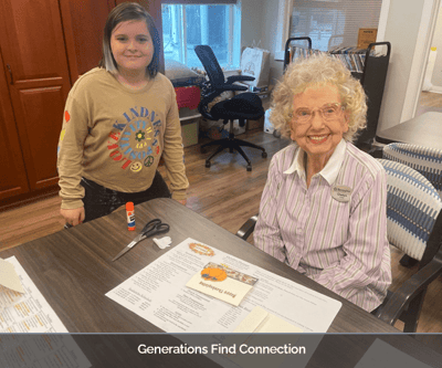 Residents engaging in a craft activity together