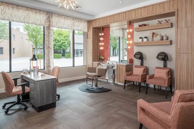 A well-appointed beauty salon area with styling stations
