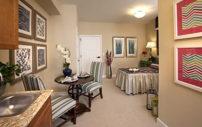 A cozy private resident room with decor and furnishings