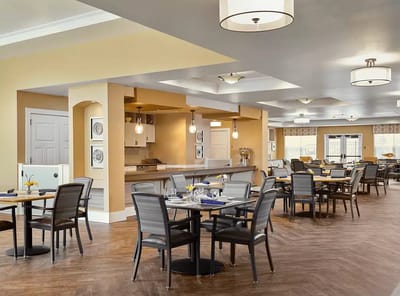 Bright dining room with tables and chairs