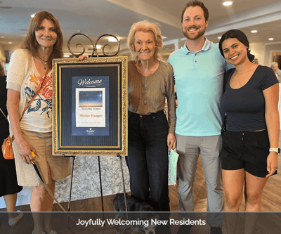 Residents joyfully welcoming new members at the facility