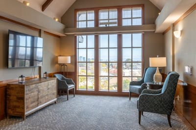 Bright common area with seating and windows