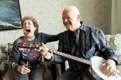 Residents enjoying music together in a common area