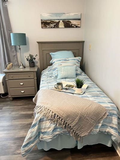 Cozy resident bedroom with bed and decor
