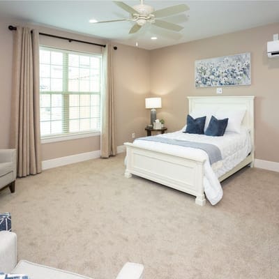 Bright, well-furnished resident room with natural light