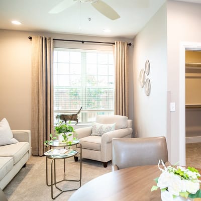 Bright common area with seating and natural light