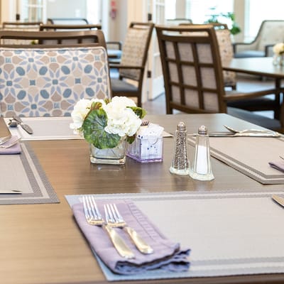 Elegant dining setup with floral centerpiece