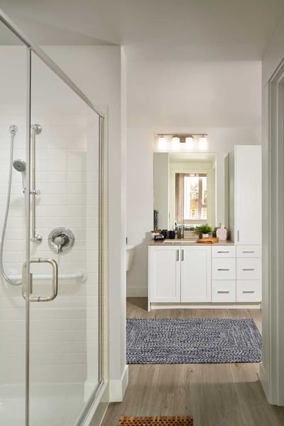 Bright modern bathroom with walk-in shower