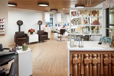 Spa area with hair styling chairs and decor