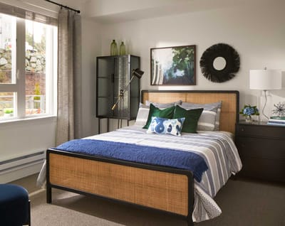 A well-decorated bedroom in a senior living facility