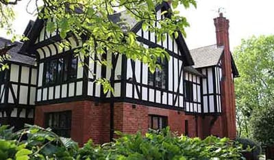Exterior view of a charming care home building