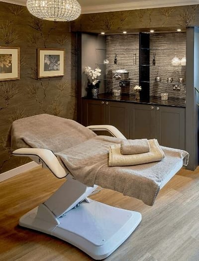 Spa treatment room with a massage table