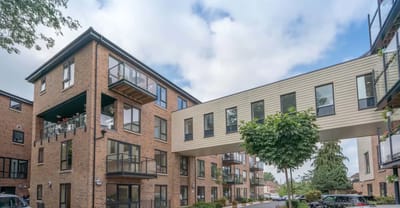 Exterior view of Quarry House with a connecting walkway