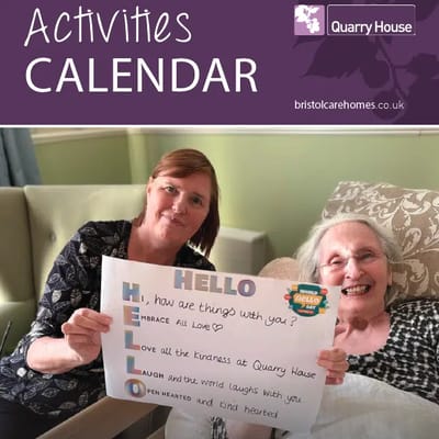 Residents engaging in activities with a welcoming sign