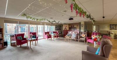 Bright common area with comfortable seating and decor