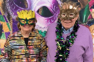 Residents enjoying a festive celebration with masks
