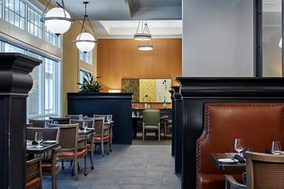 Modern dining room setup within a senior living facility