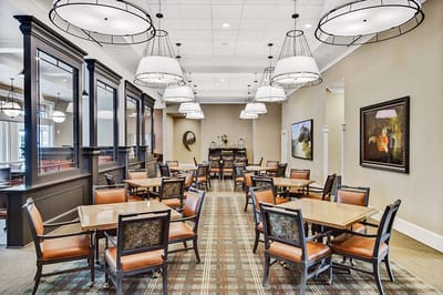 Dining room with tables and chairs set up