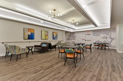 Common area with seating and artwork on the walls