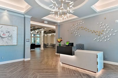 Bright reception area with modern decor and seating