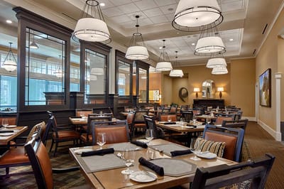 Elegant dining area with tables and lighting