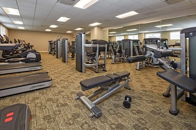 Well-equipped fitness center with exercise machines