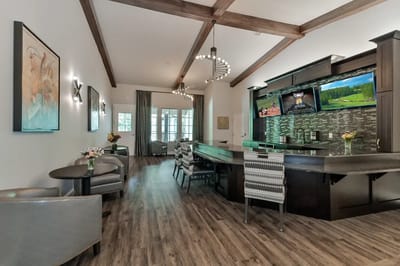 Interior common area with seating and kitchen bar