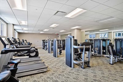 Interior view of a fitness room with exercise equipment