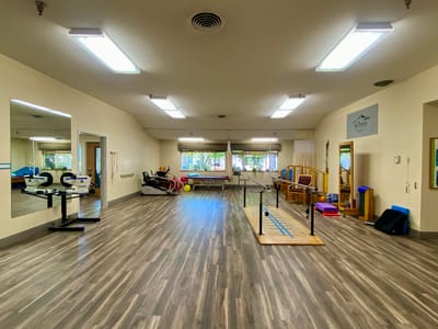 Interior space with exercise equipment and therapy area