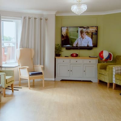 Common area with seating and television
