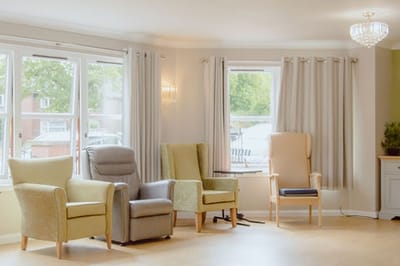 Common area with chairs and natural light