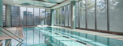 Indoor swimming pool with large windows