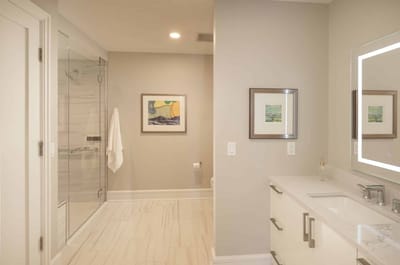 Modern bathroom with shower and art decor