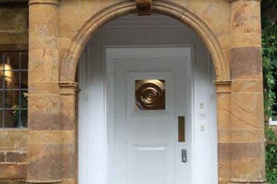 Entrance door with decorative archway
