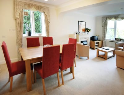Cozy common area with dining table and seating