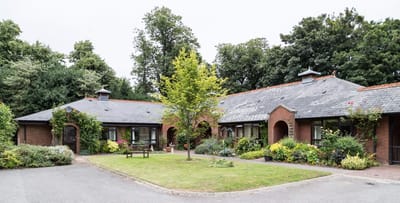 Exterior view of Woodside House buildings and garden