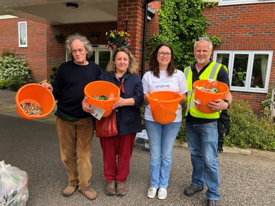 Residents and staff participating in an outdoor activity.