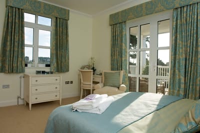 Bright and welcoming resident room with a view.