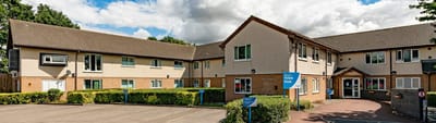 Exterior view of Dean Lodge assisted living facility