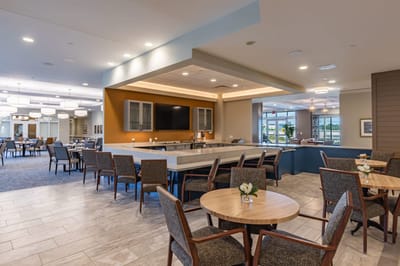 Modern common area with tables and chairs